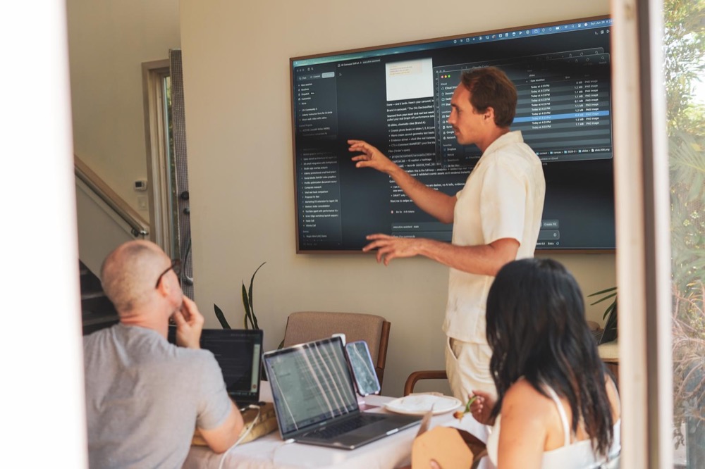 Benza teaching at the screen during a past bootcamp